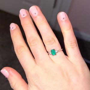 Emerald, diamond and white gold ring